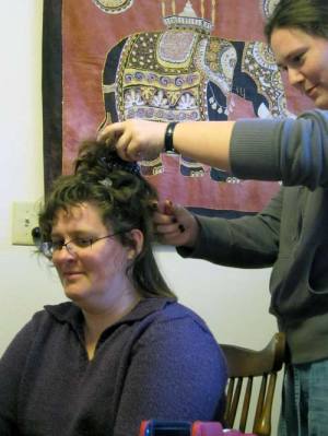 kelli getting her hair straightened for the first time by amanda